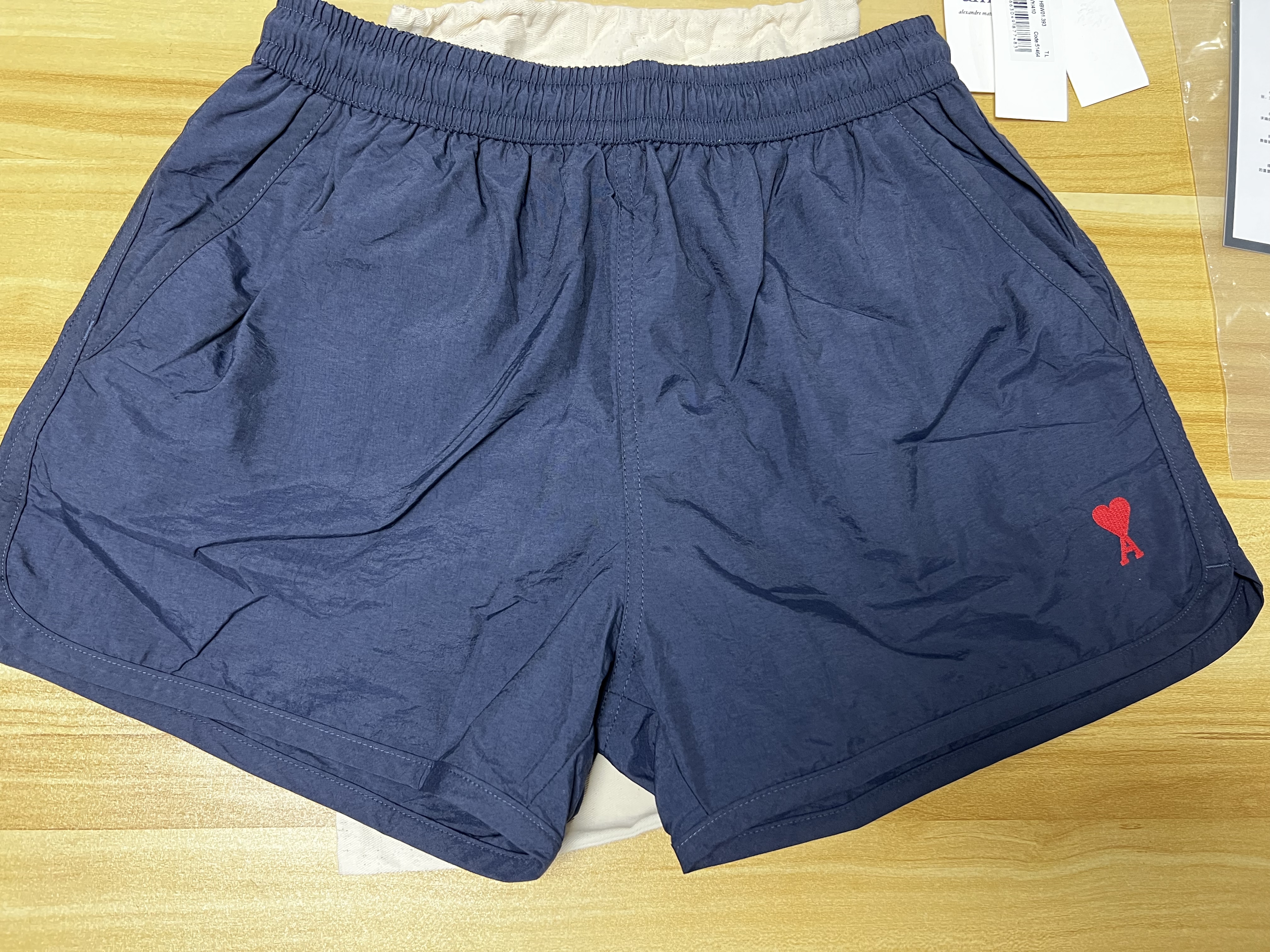 아미 하트 로고 롱 스윔 쇼츠 블랙